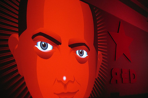 painted face with eyes watching